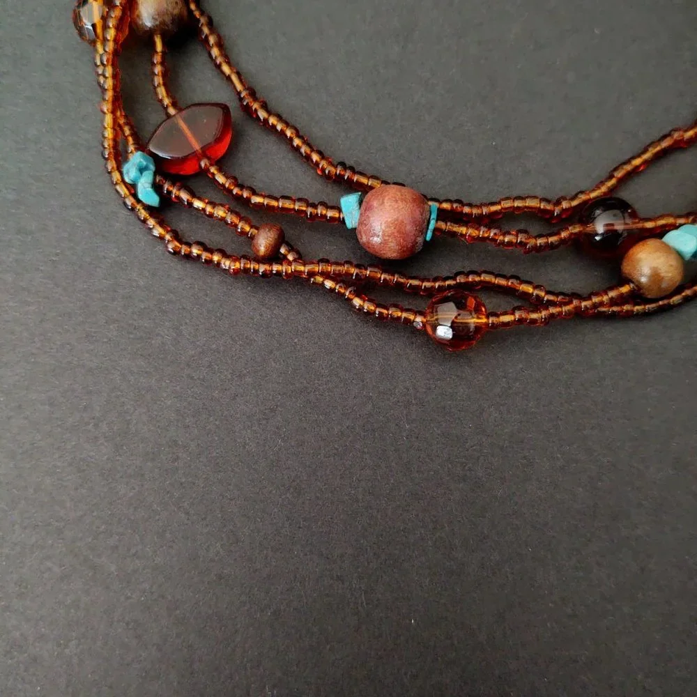 Amber and blue tones-seed bead and wood bead multi strand necklace